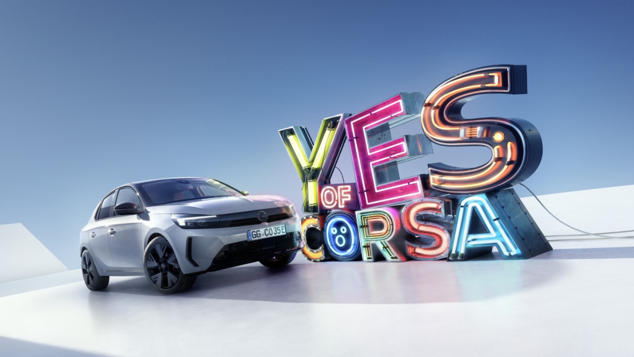 Side view of grey Opel Corsa Electric with "Yes of Corsa" letters